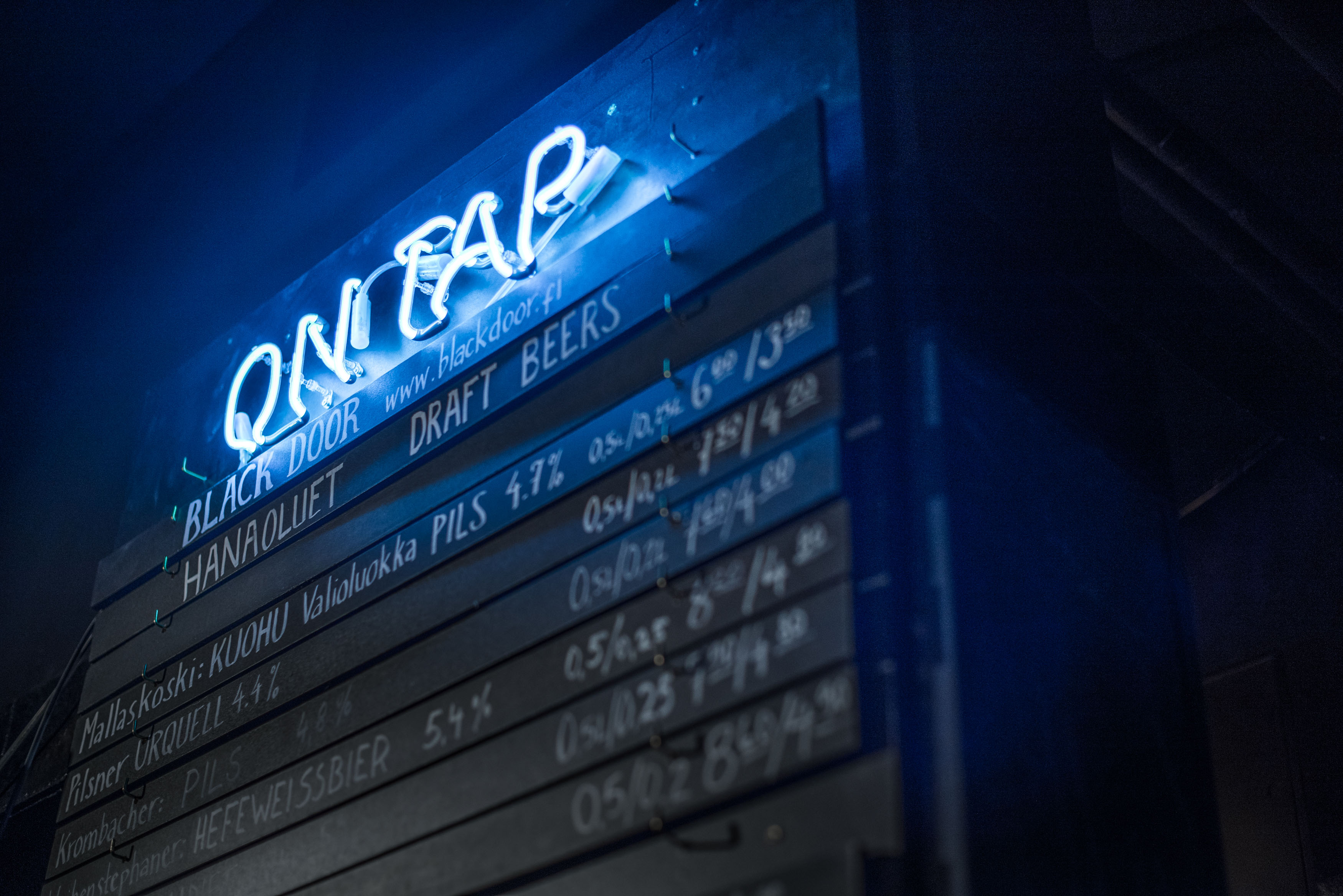 Black Door bar neon sign